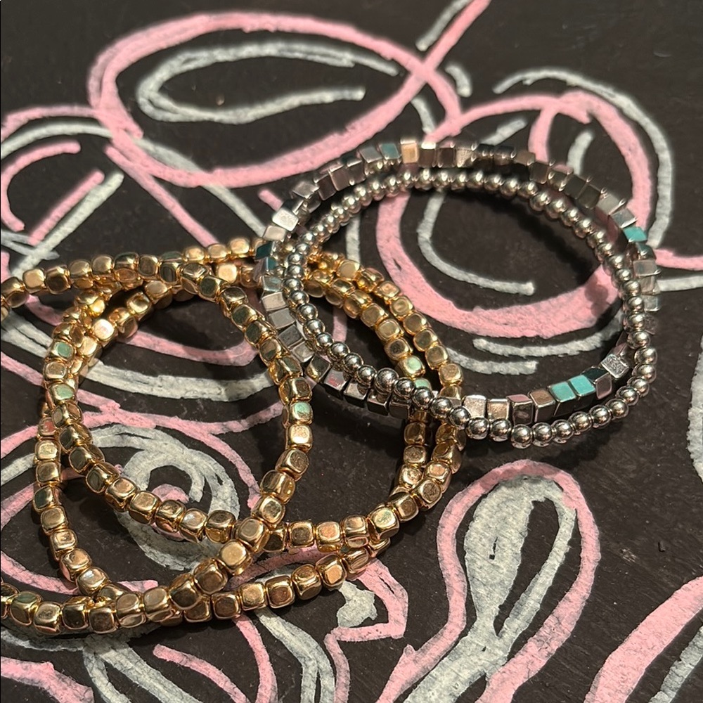 Elegant Gold and Silver Beaded Bracelet Set
5 single strands